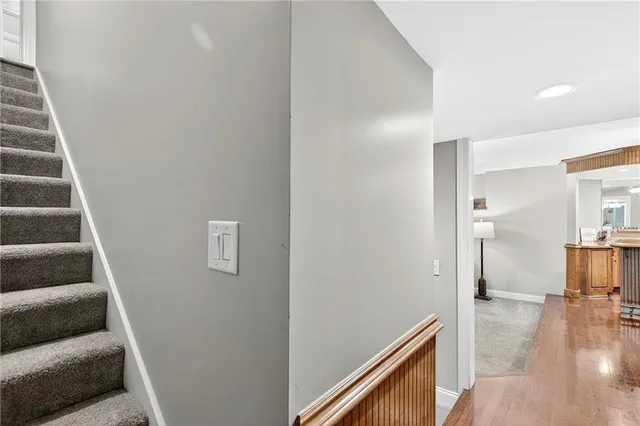 a bathroom with a toilet sink and shower