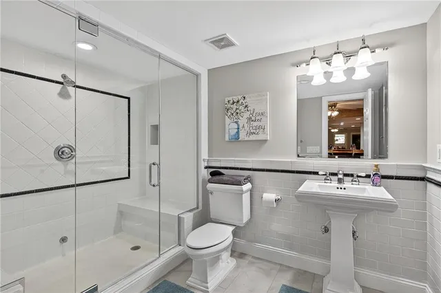 an aerial view of a house with a swimming pool