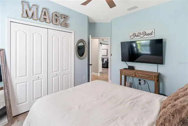 a view of a two chairs in the patio