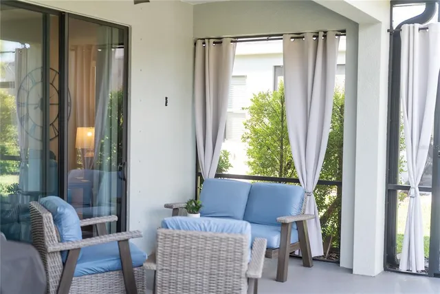 a view of a garden with a building in the background