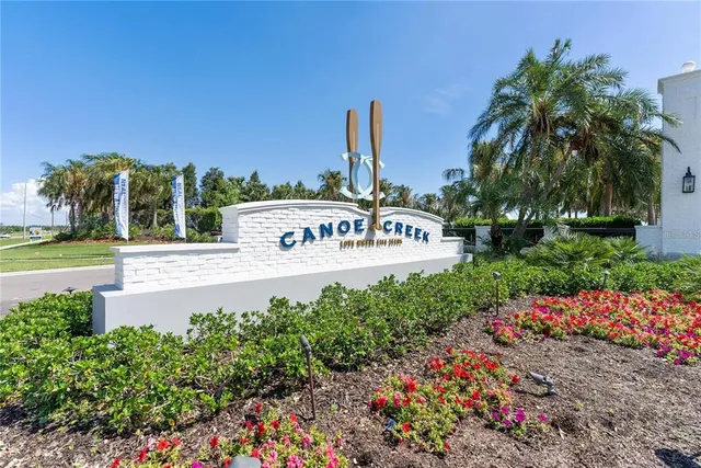 a view of swimming pool with outdoor seating