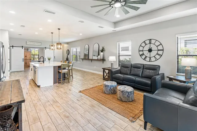 a living room with furniture and a window