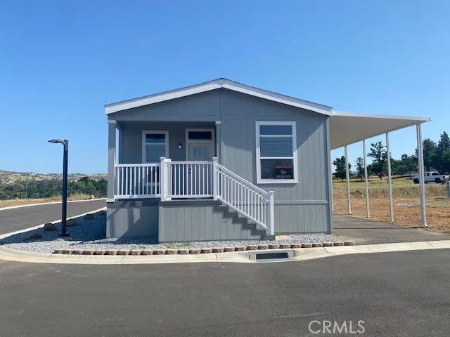 a view of a house with a street