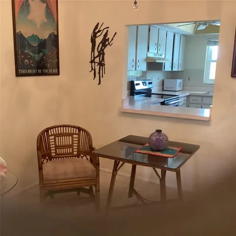 a bedroom with a bed and a chair