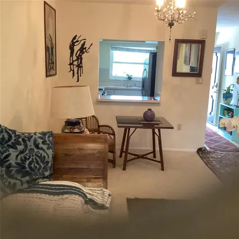 a bedroom with a bed and a table in it