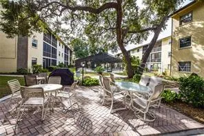 a view of a patio with a yard