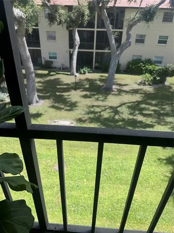 a view of swimming pool from a window