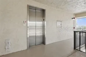 an empty room with wooden floor