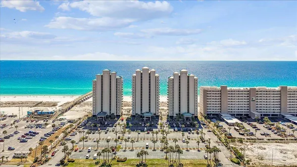 a view of an ocean and a yard