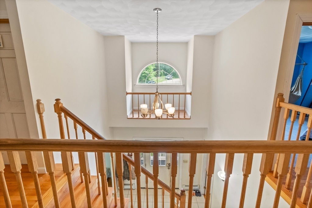 85 Wheeler Road Princeton, MA 01541 - Photo 11 of 28 a view of a hallway with windows