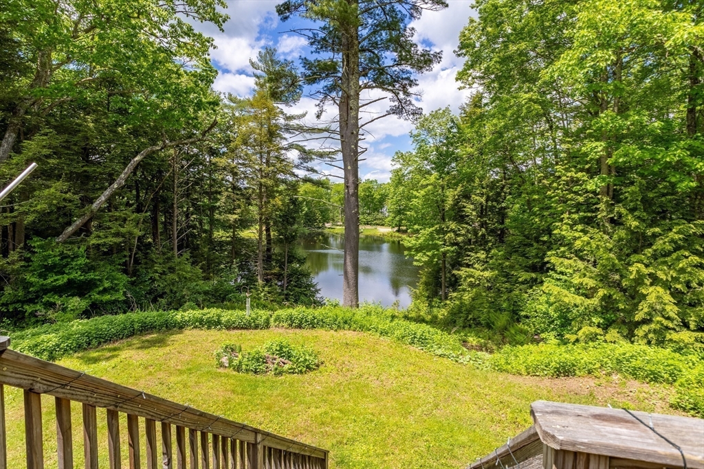 85 Wheeler Road Princeton, MA 01541 - Photo 20 of 28 a view of a swimming pool with a patio and a yard