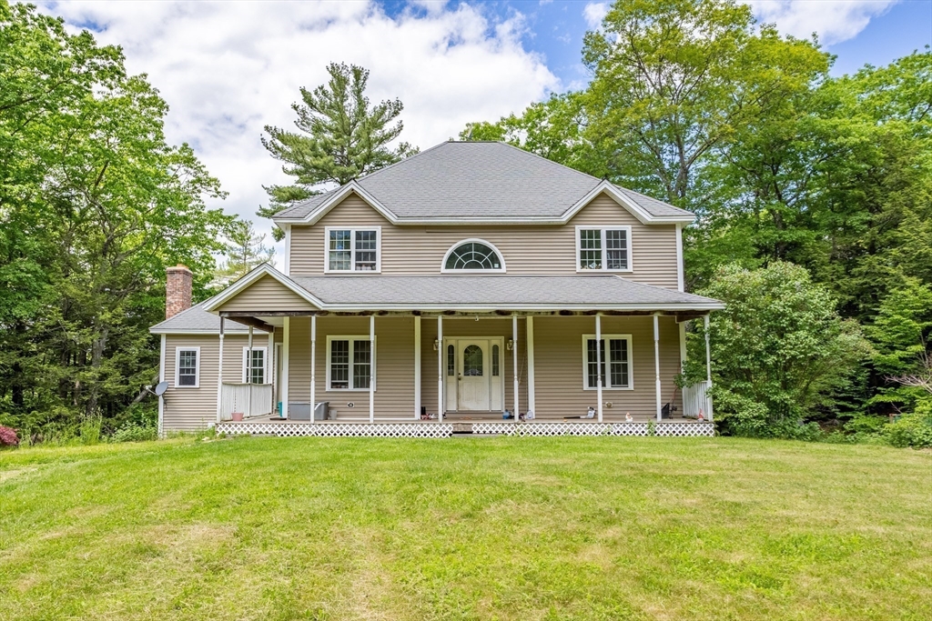 85 Wheeler Road Princeton, MA 01541 - Photo 3 of 28 a front view of a house with garden