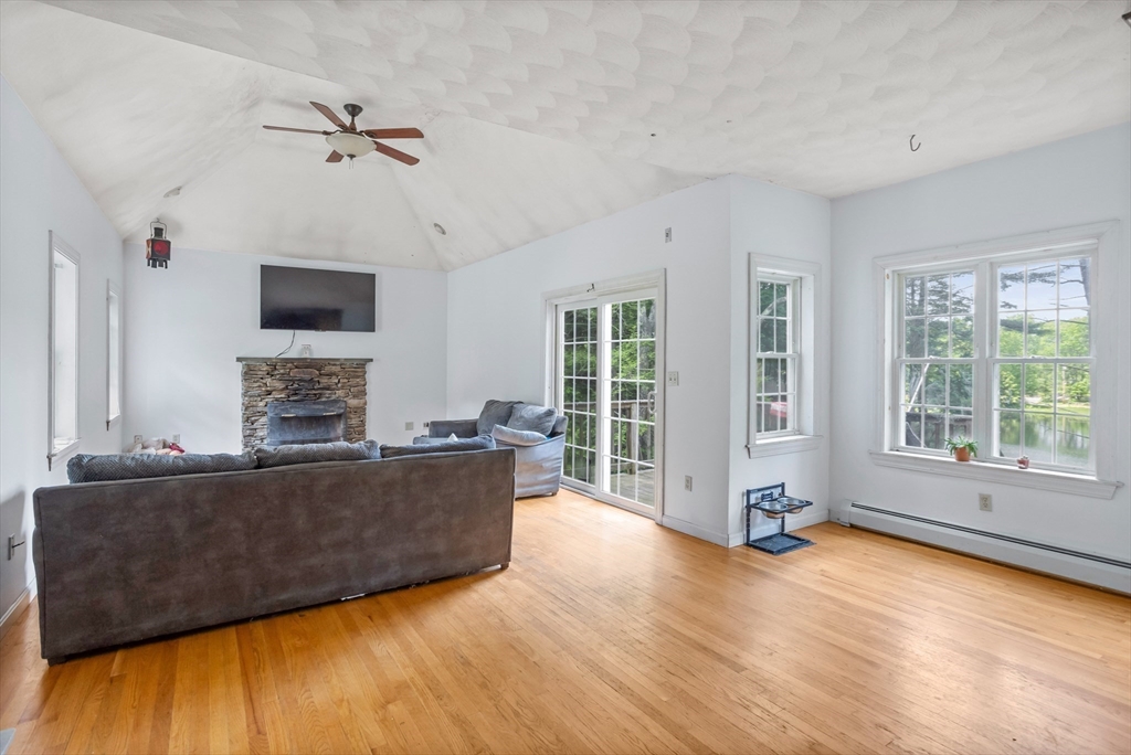 85 Wheeler Road Princeton, MA 01541 - Photo 6 of 28 a living room with furniture and a flat screen tv