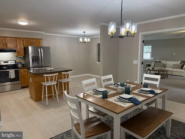 a view of a dining room with furniture
