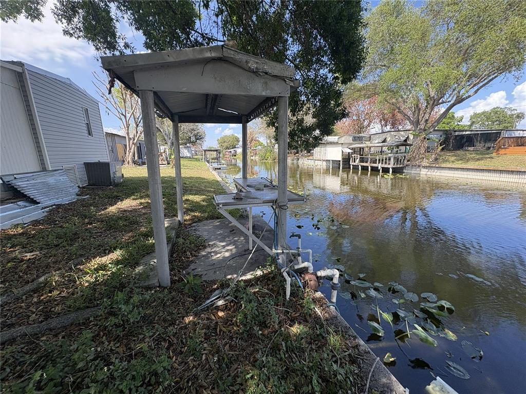 1183 9th Street Okeechobee, FL 34974 - Photo 13 of 14 a backyard of a house with lots of green space