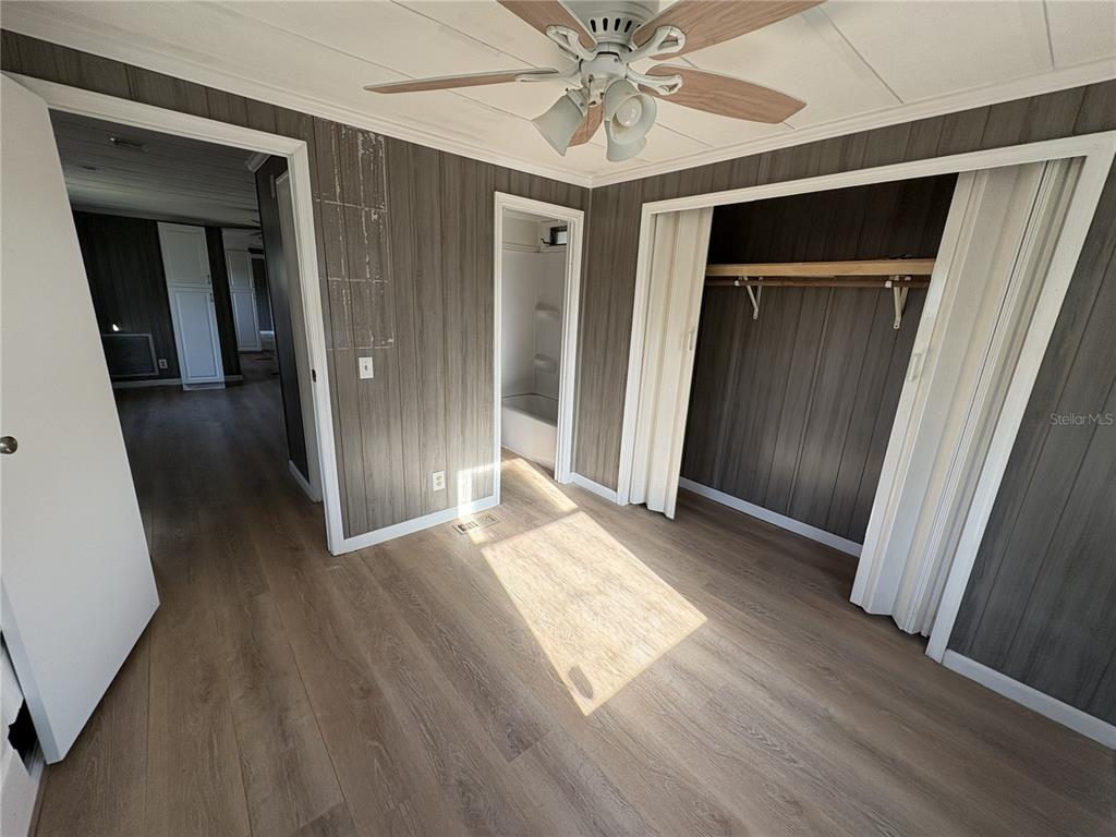 1183 9th Street Okeechobee, FL 34974 - Photo 5 of 14 a view of hallway with wooden floor