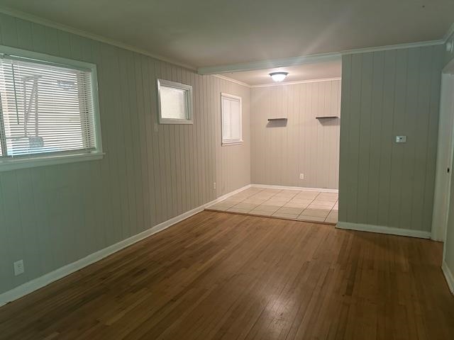 1406 Sycamore Road Collierville, TN 38017 - Photo 6 of 6 Empty room featuring crown molding, wood-type flooring, and baseboards