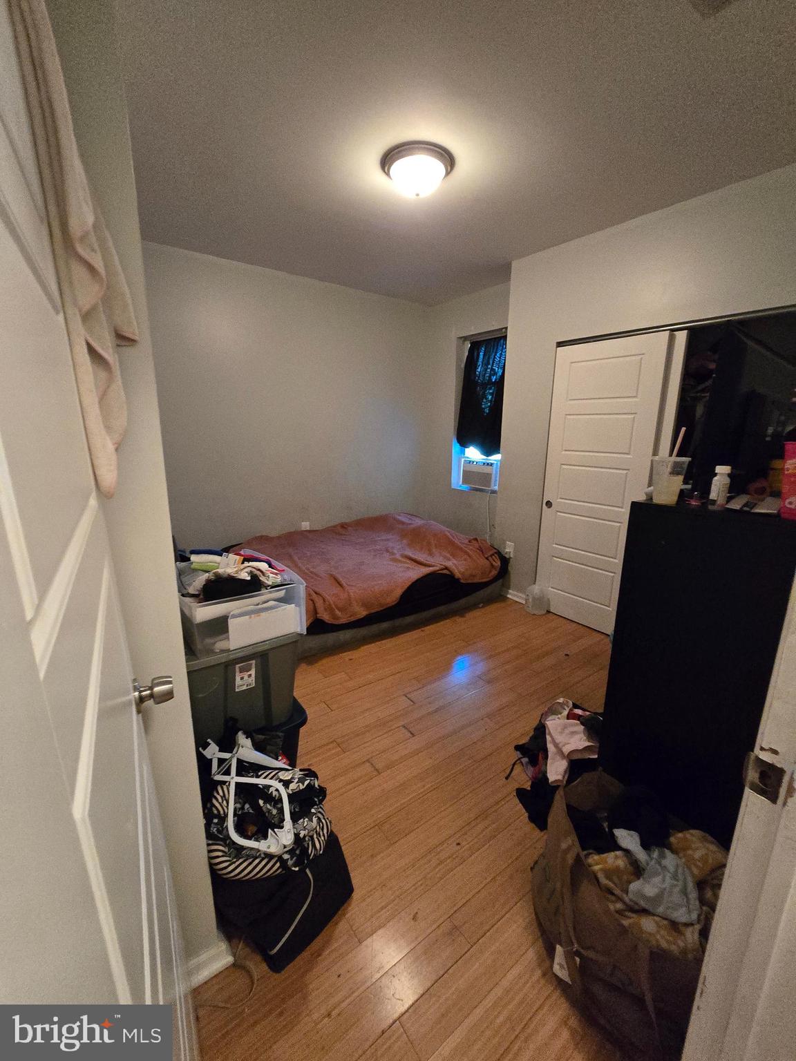 1833 Master Street Philadelphia, PA 19121 - Photo 12 of 22 a bedroom with furniture and a wooden floor