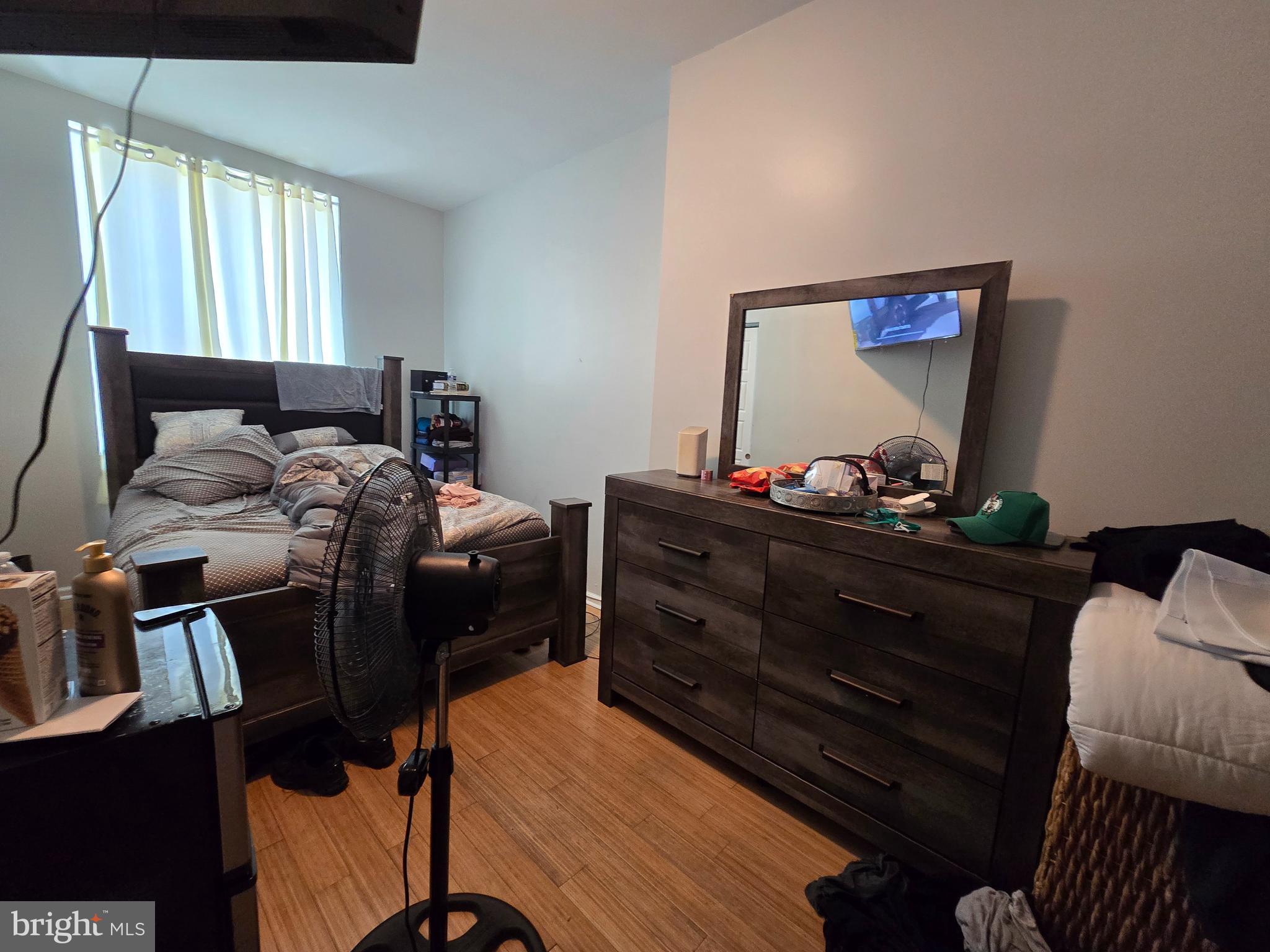 1833 Master Street Philadelphia, PA 19121 - Photo 18 of 22 a bedroom with furniture and a window