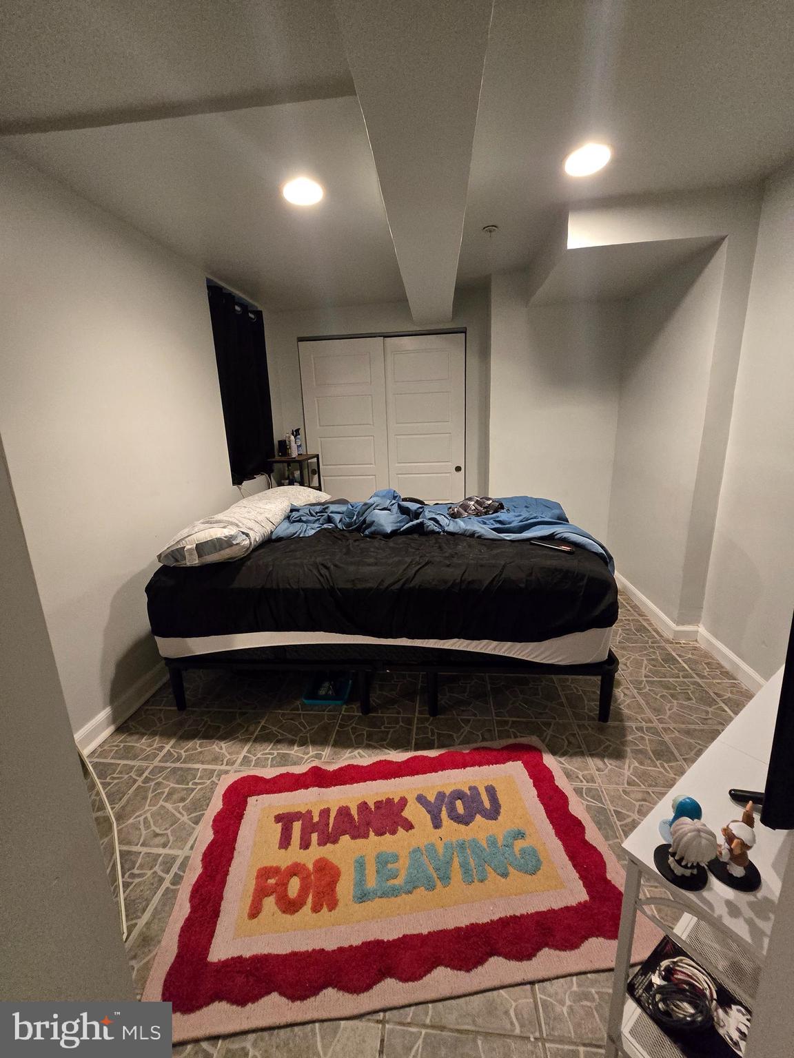 1833 Master Street Philadelphia, PA 19121 - Photo 20 of 22 a bedroom with a bed and a rug