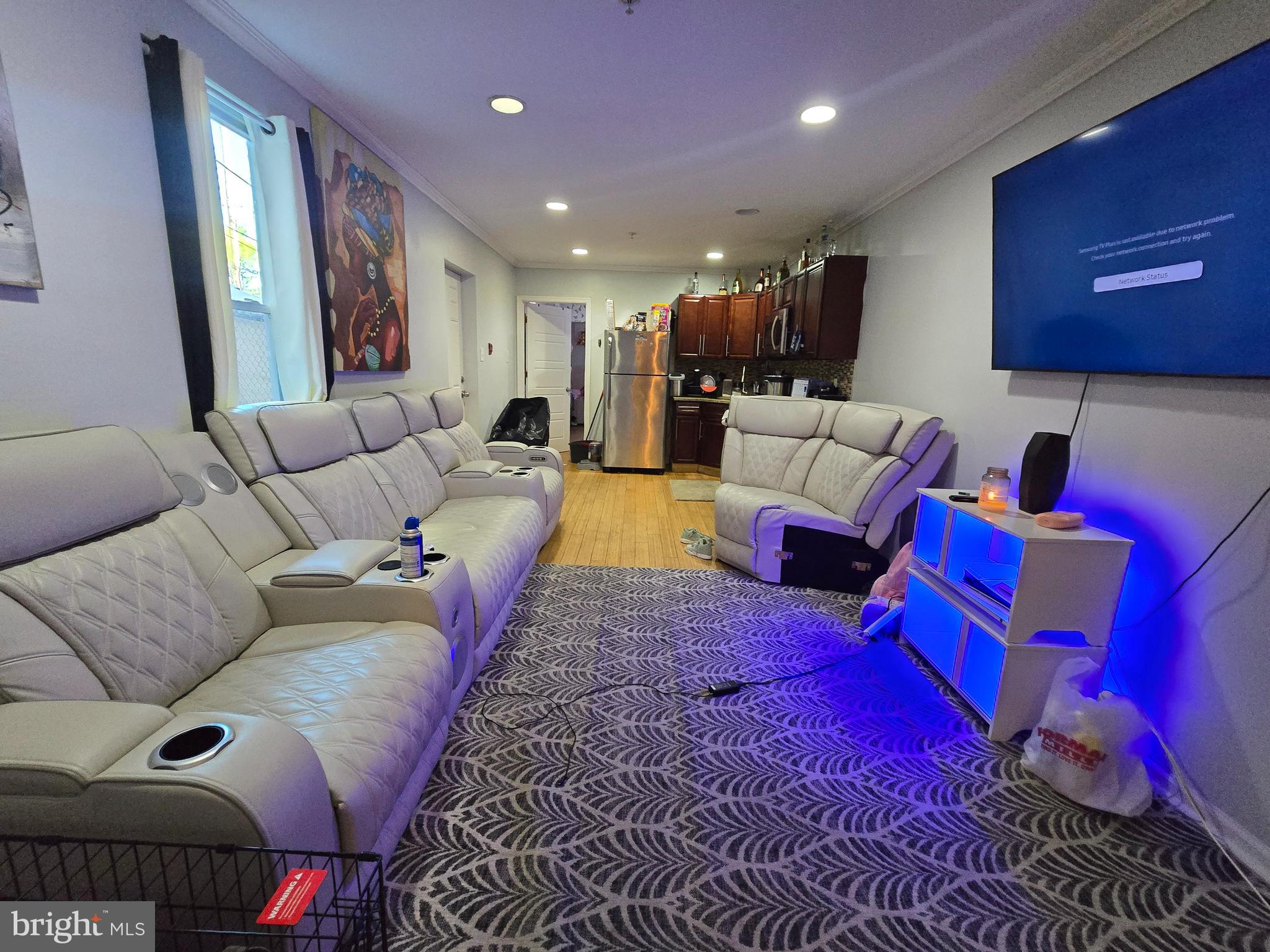 1833 Master Street Philadelphia, PA 19121 - Photo 2 of 22 a living room with furniture and a rug