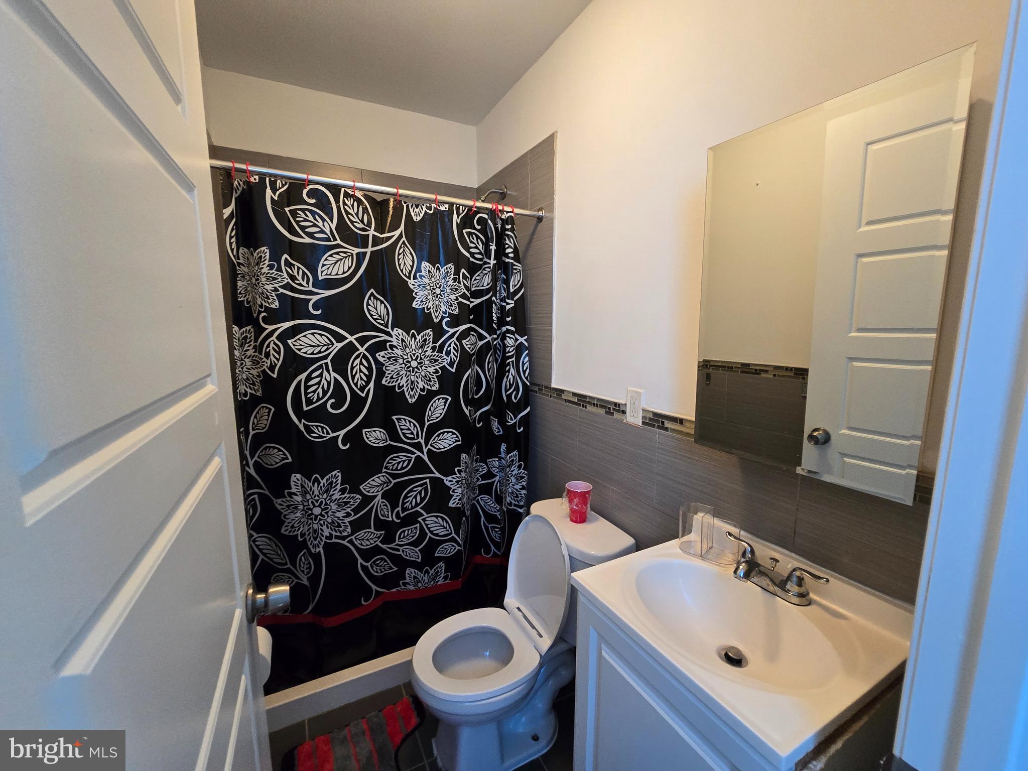 1833 Master Street Philadelphia, PA 19121 - Photo 4 of 22 a bathroom with a sink toilet and shower