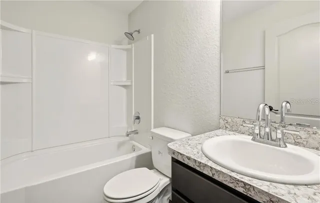 a view of livingroom with furniture