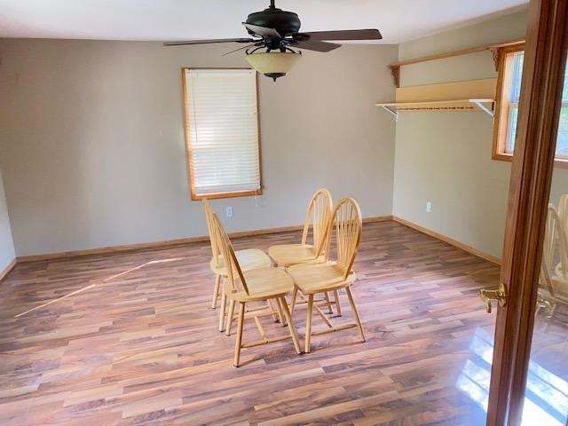 5003 Beacon Ridge Lowell, IN 46356 - Photo 9 of 18 a view of a dining room with furniture and a chandelier