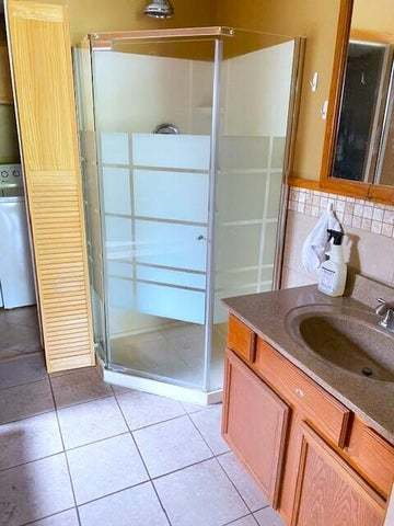 5003 Beacon Ridge Lowell, IN 46356 - Photo 10 of 18 a bathroom with a tub and shower