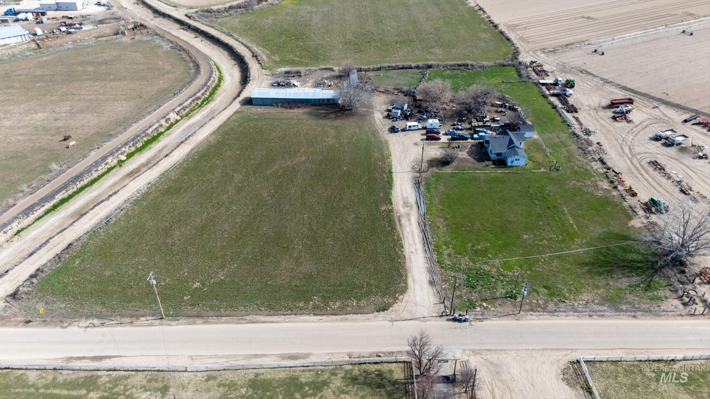 View of property location featuring rural landscape and farmland