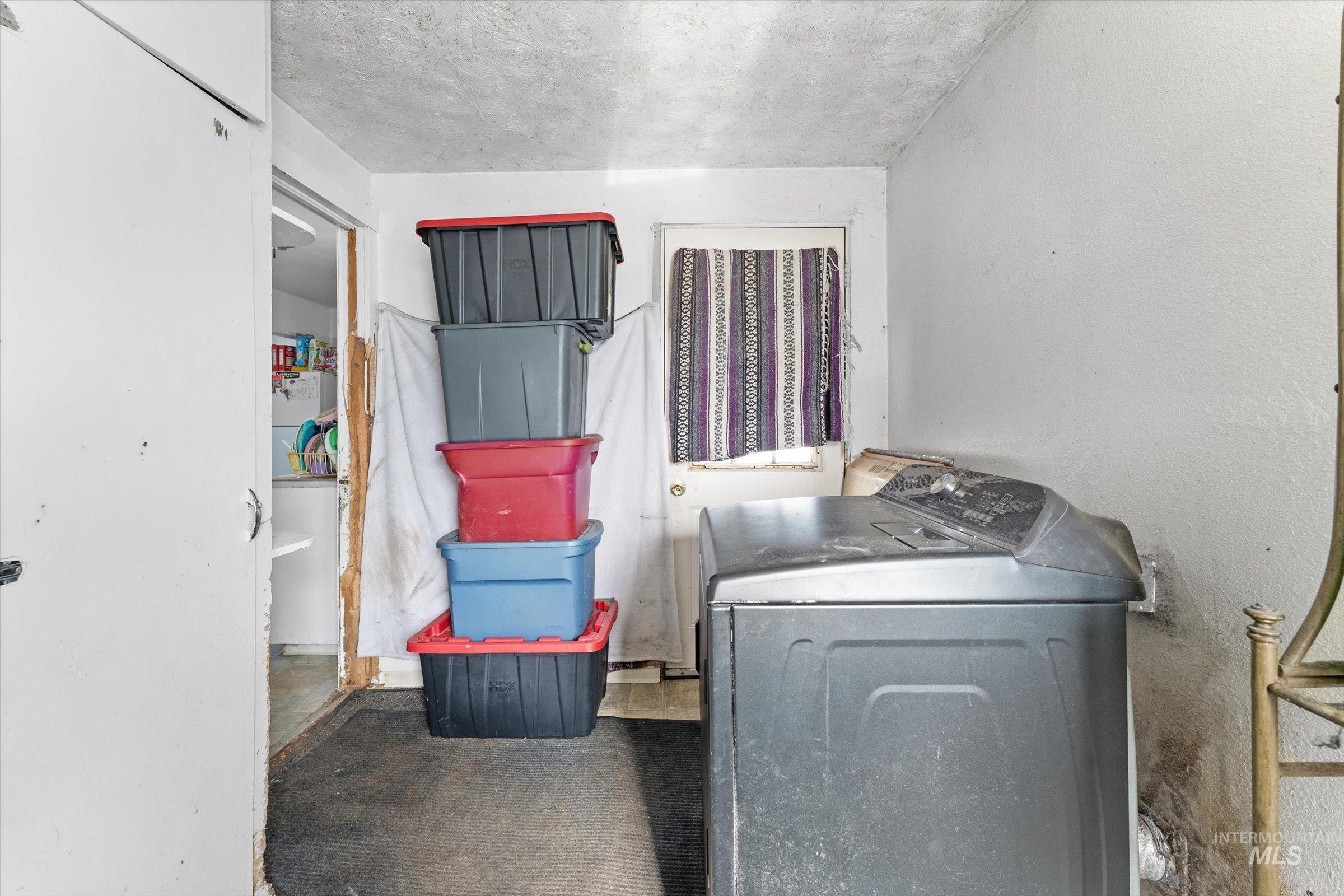 20286 Travis Road Wilder, ID 83676 - Photo 12 of 48 Laundry area featuring washer / dryer