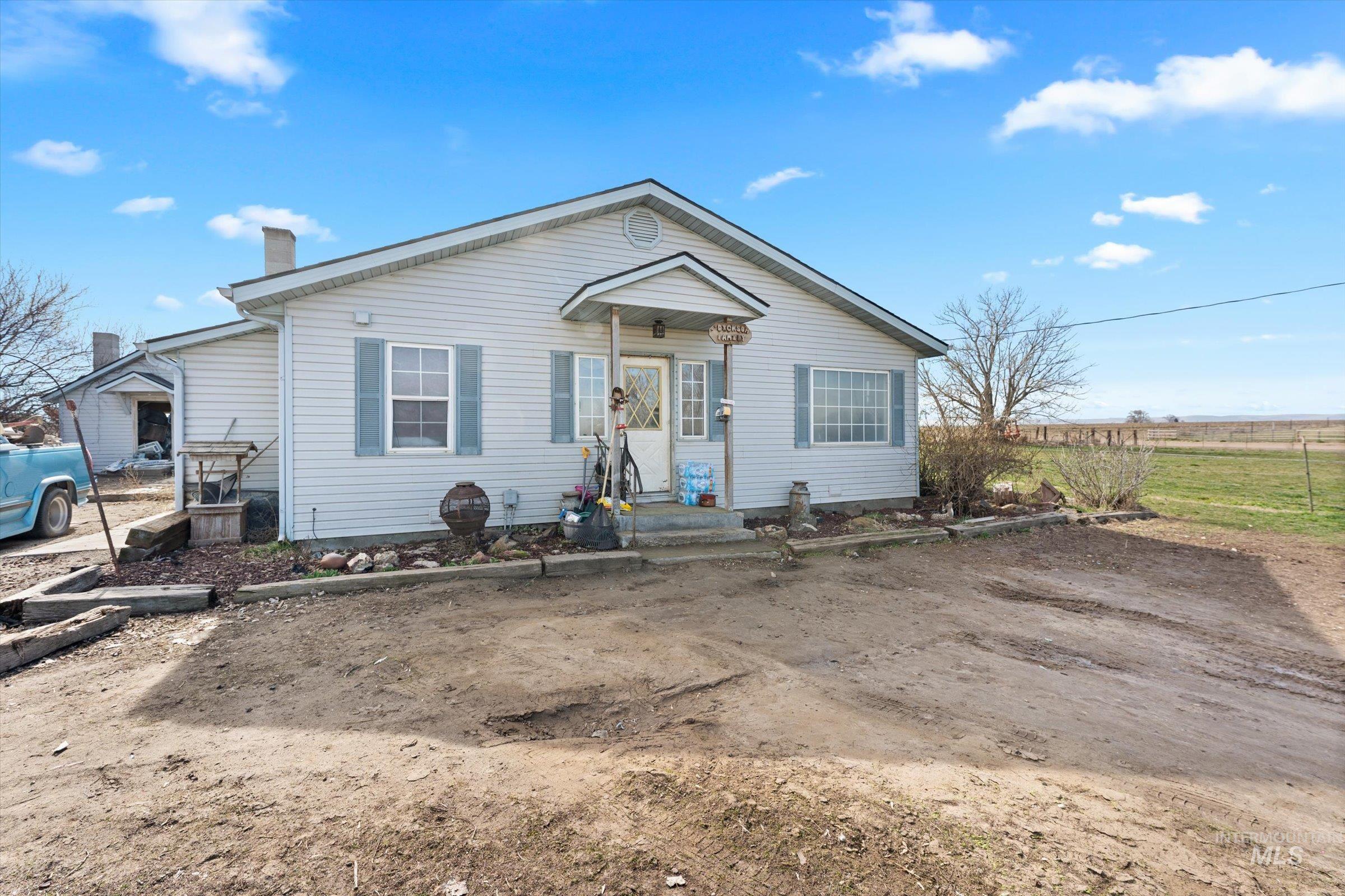 20286 Travis Road Wilder, ID 83676 - Photo 2 of 48 Bungalow-style home featuring a chimney