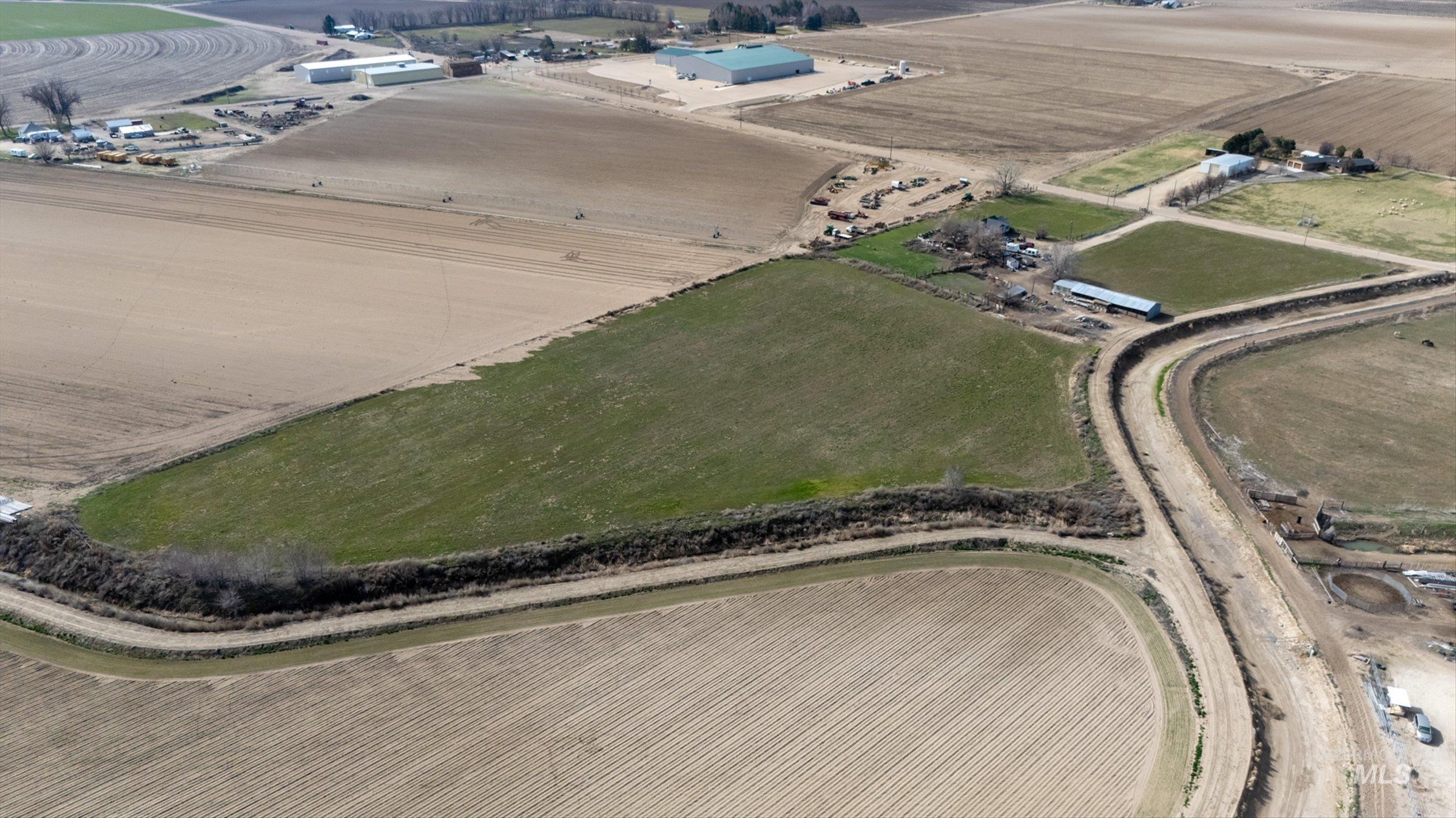 20286 Travis Road Wilder, ID 83676 - Photo 35 of 48 Aerial overview of property's location with rural landscape and farmland