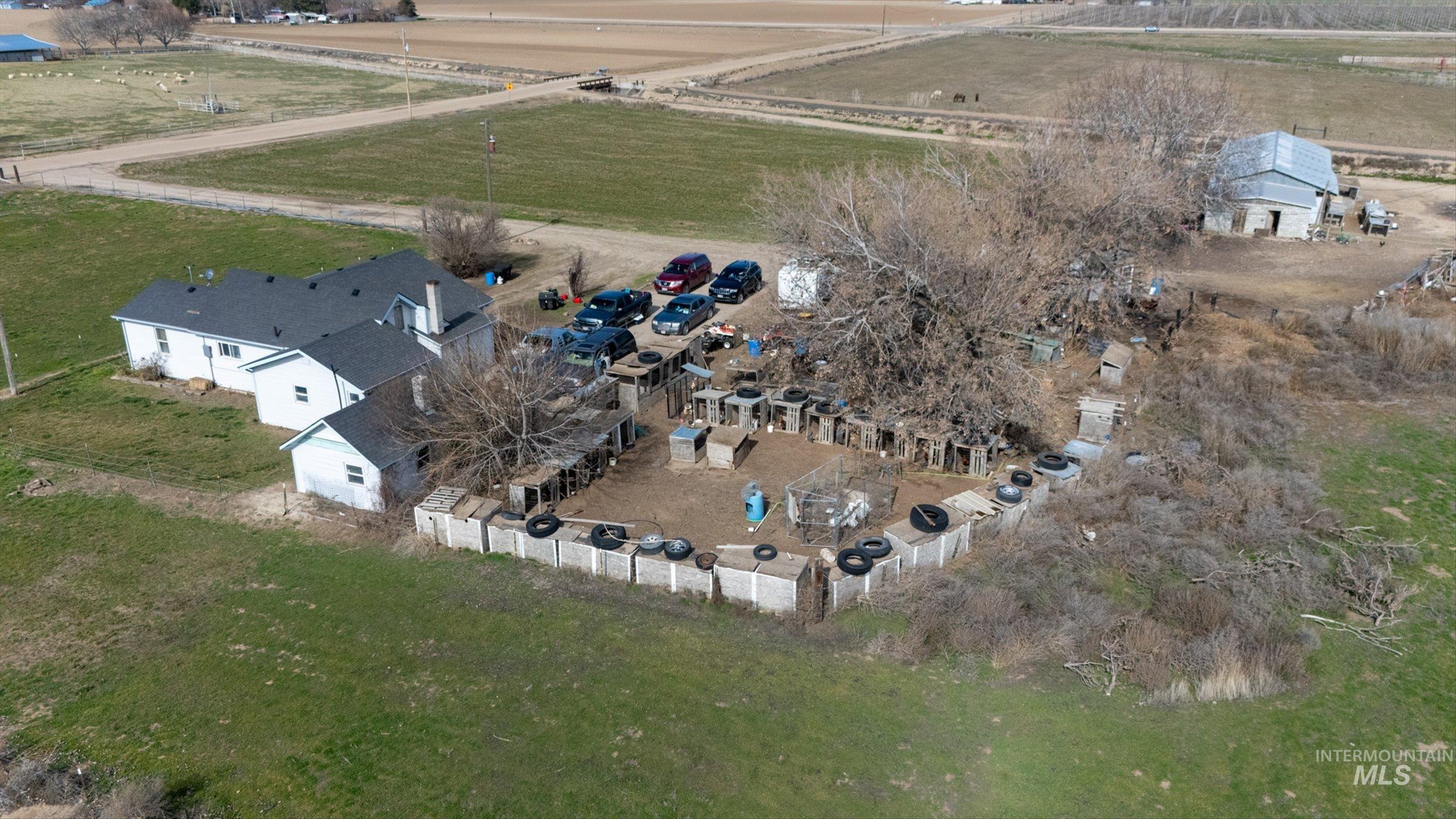 20286 Travis Road Wilder, ID 83676 - Photo 36 of 48 Aerial view of property and surrounding area featuring rural landscape