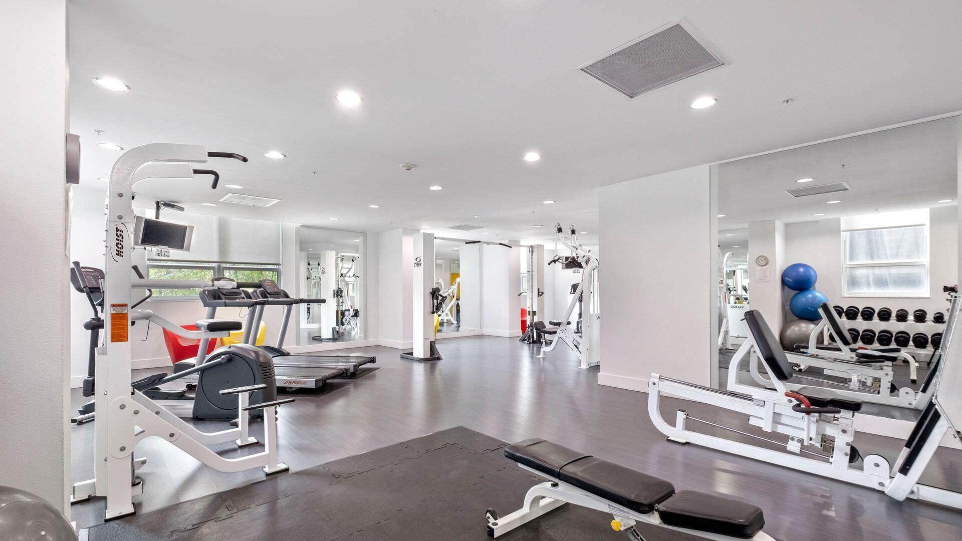 234 Northeast 3rd Street, Unit 2206 Miami, FL 33132 - Photo 28 of 30 a view of a room with gym equipment