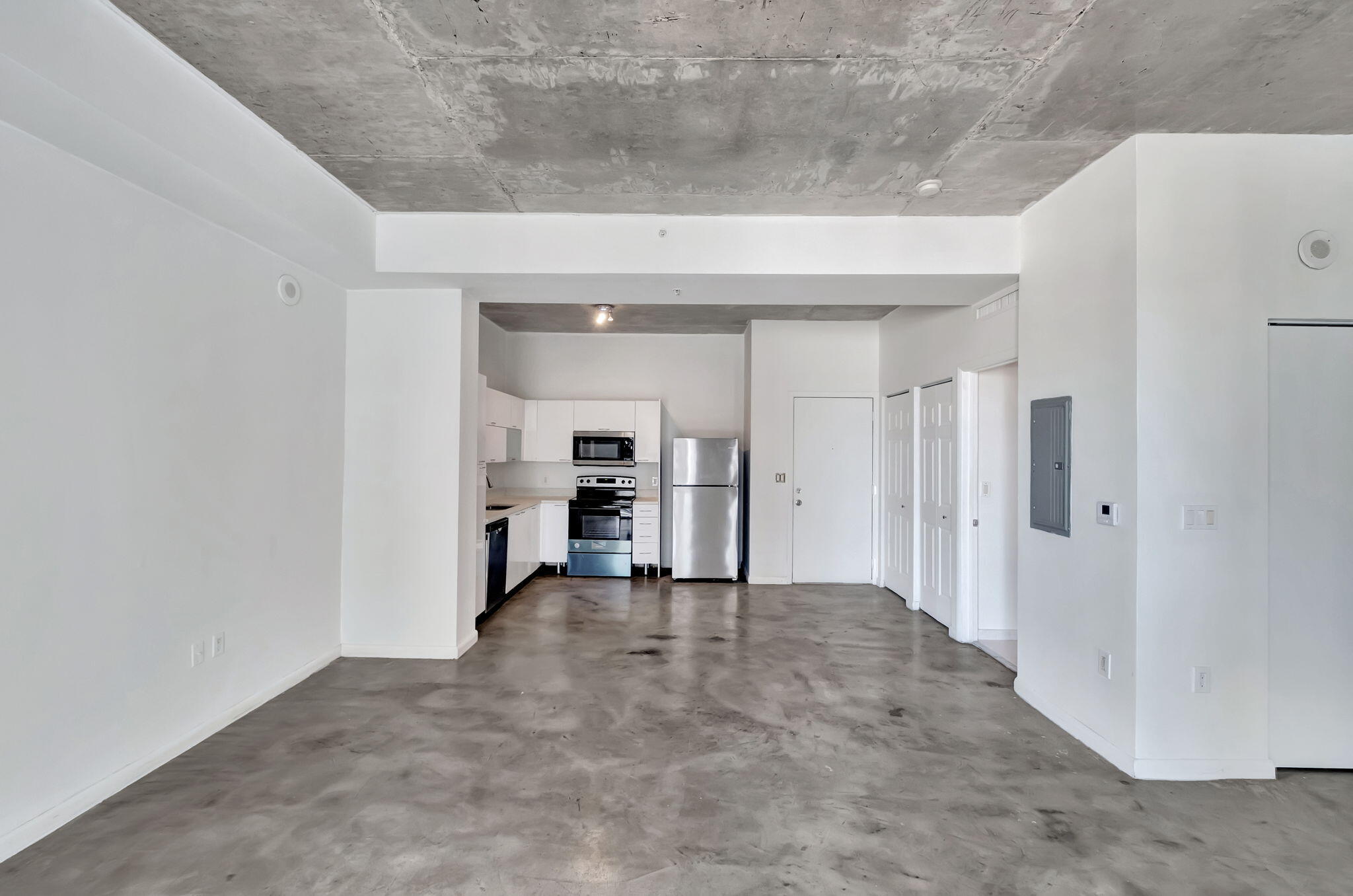 234 Northeast 3rd Street, Unit 2206 Miami, FL 33132 - Photo 3 of 30 a view of a big room with closet and cabinet