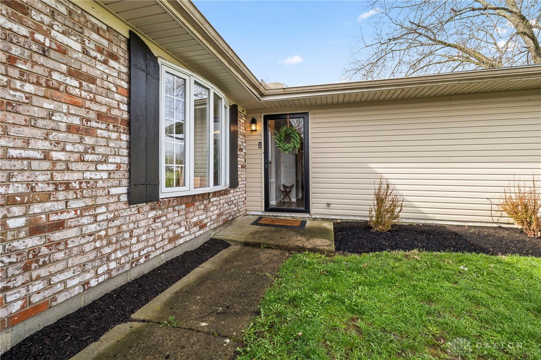 8969 Franklin-Trenton Road Franklin, OH 45005 - Photo 4 of 49 This inviting home features a charming brick facade with durable siding and a welcoming entryway.