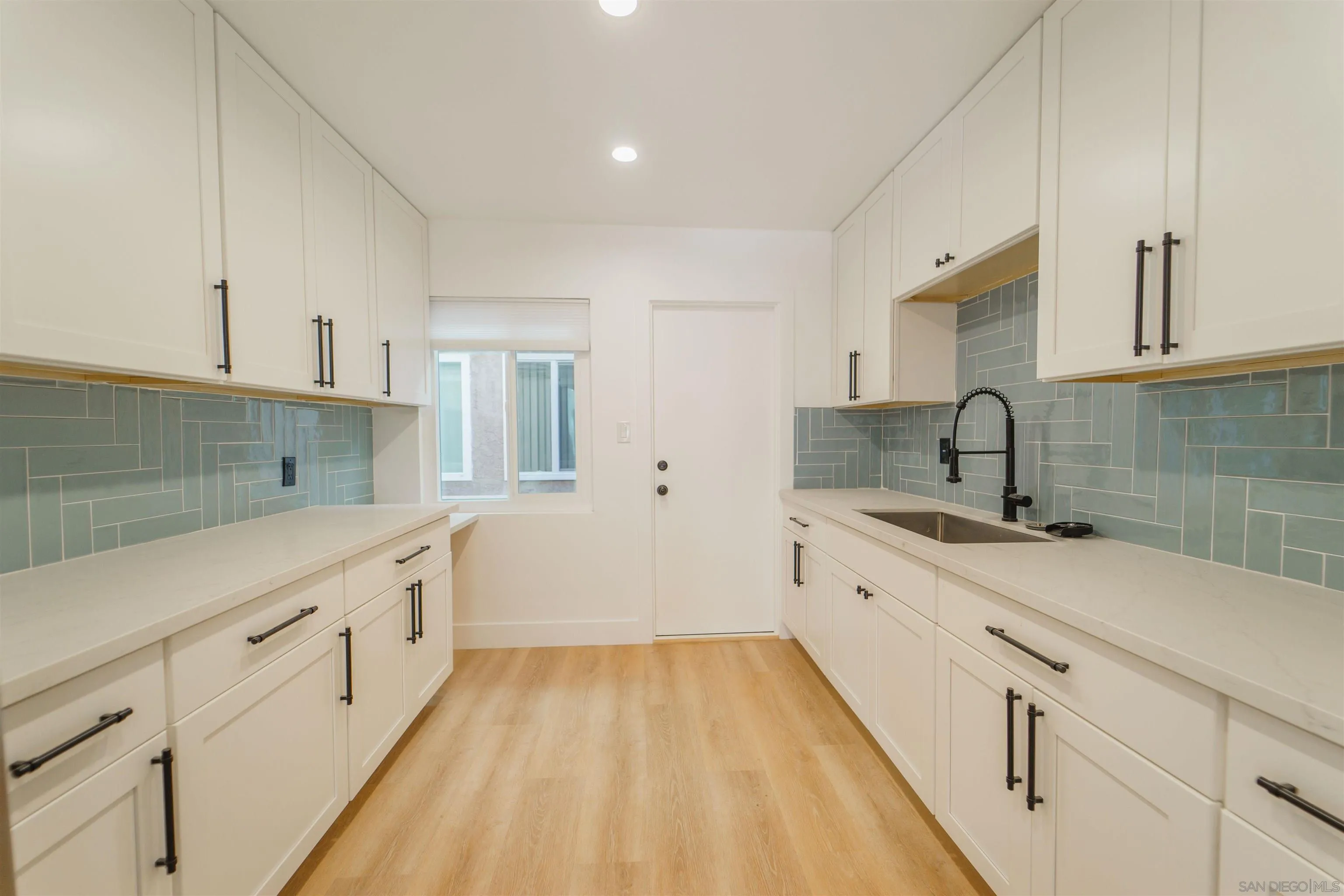 4518-24 Kansas Street San Diego, CA 92116 - Photo 18 of 33 a view of a kitchen with electric appliances