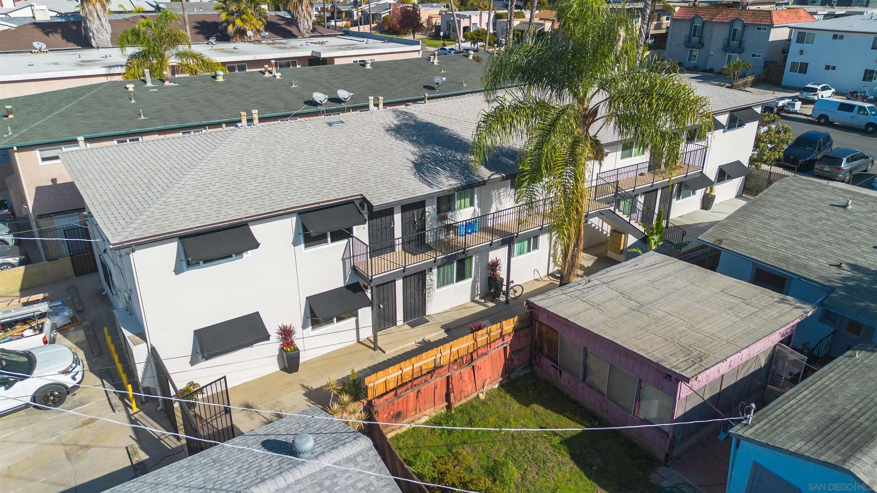 4518-24 Kansas Street San Diego, CA 92116 - Photo 9 of 33 an aerial view of a house with a yard