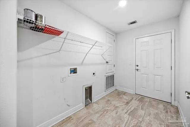 a view of a room with white walls