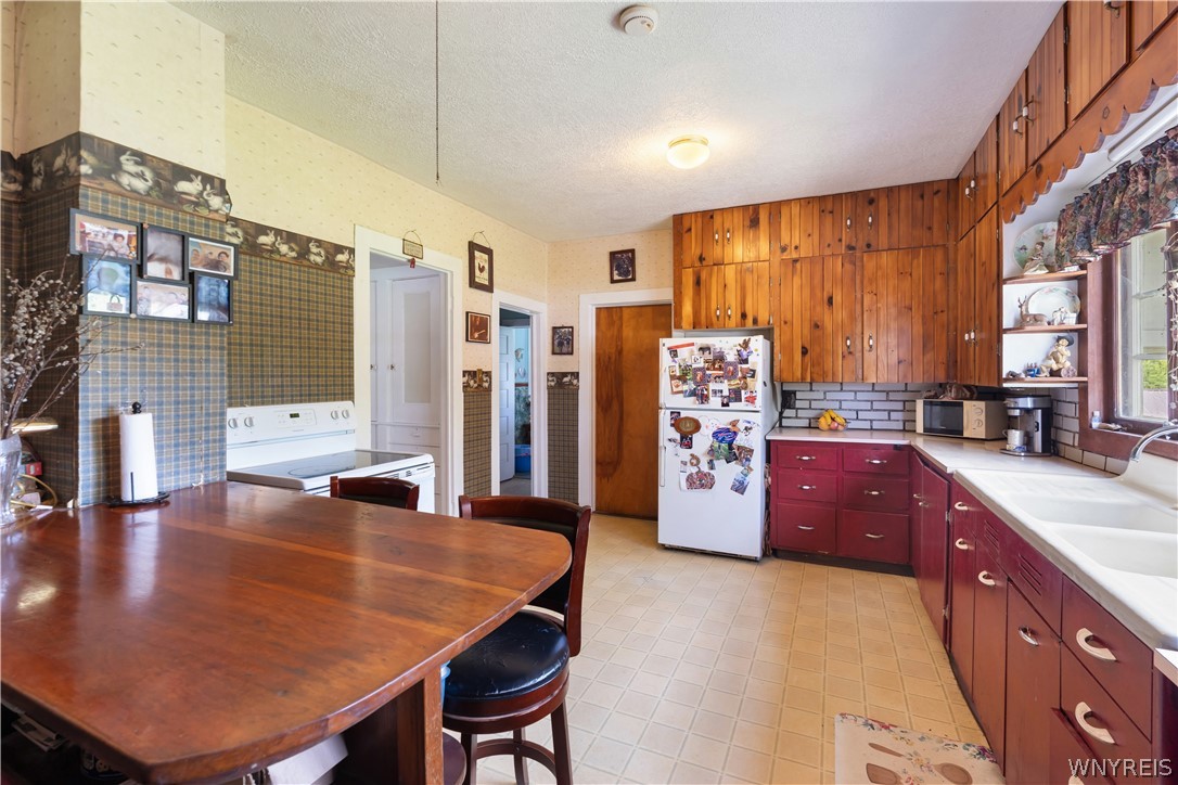 1136 Creek Road Attica, NY 14011 - Photo 23 of 50 Main House Kitchen/Dining Area