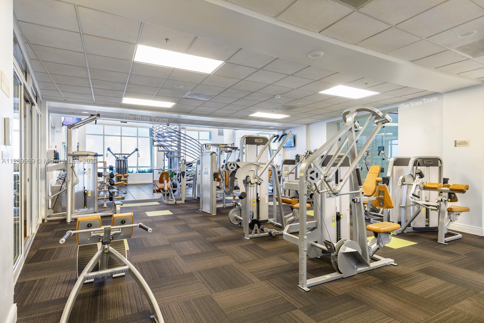 848 Brickell Key Drive, Unit 1602 Miami, FL 33131 - Photo 28 of 33 a view of a room with gym equipment