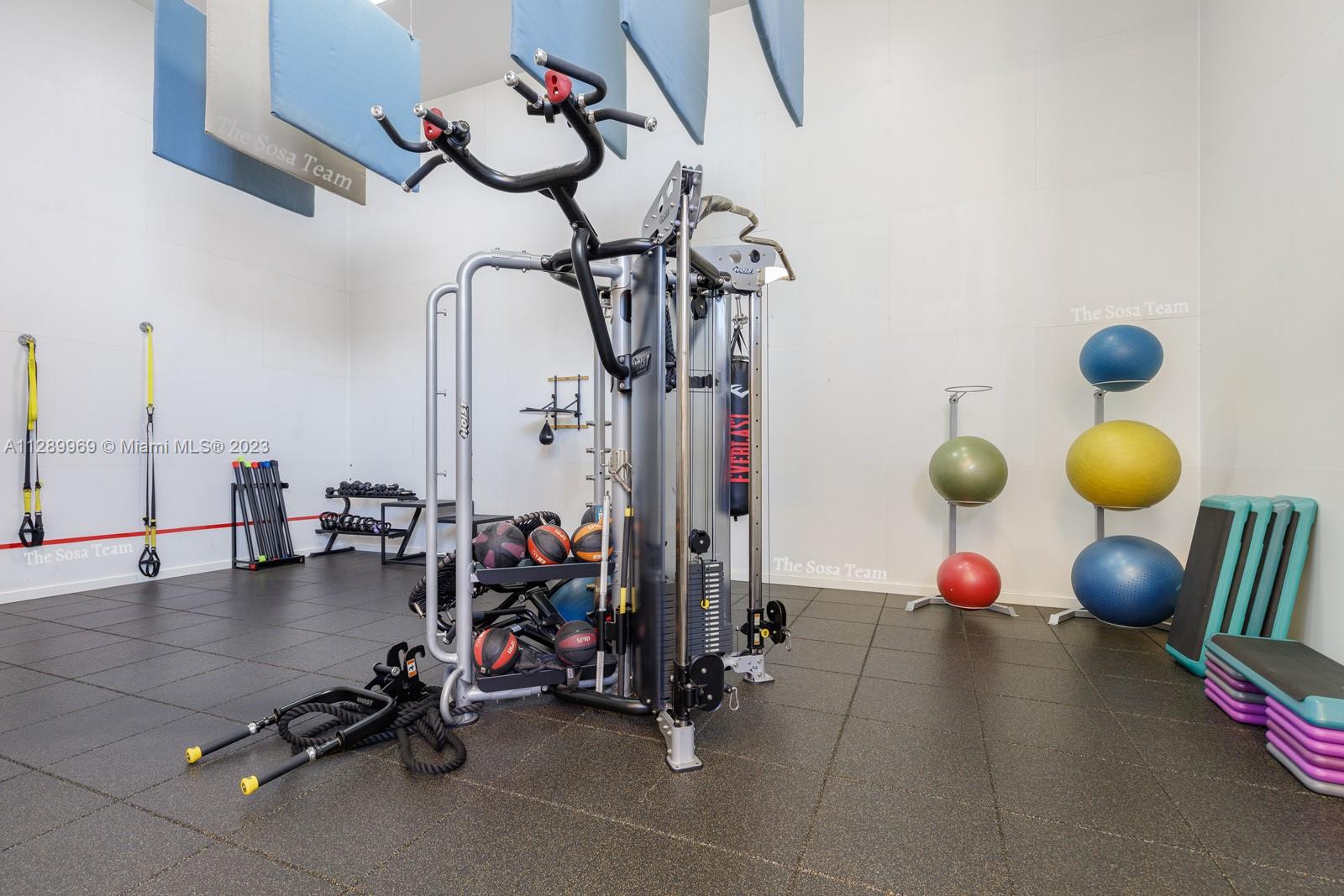 848 Brickell Key Drive, Unit 1602 Miami, FL 33131 - Photo 31 of 33 a view of a room with gym equipment