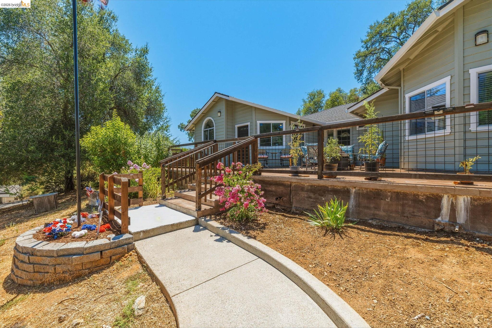 18570 Pradera Real Road Sonora, CA 95370 - Photo 9 of 66 walkway from driveway to front of house