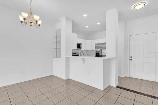 a view of kitchen and windows