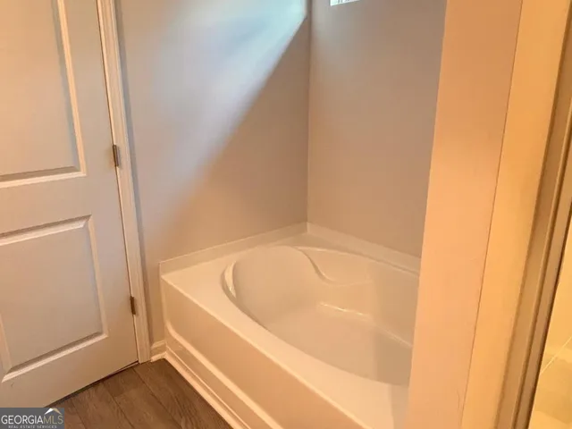 a bathroom with a bathtub