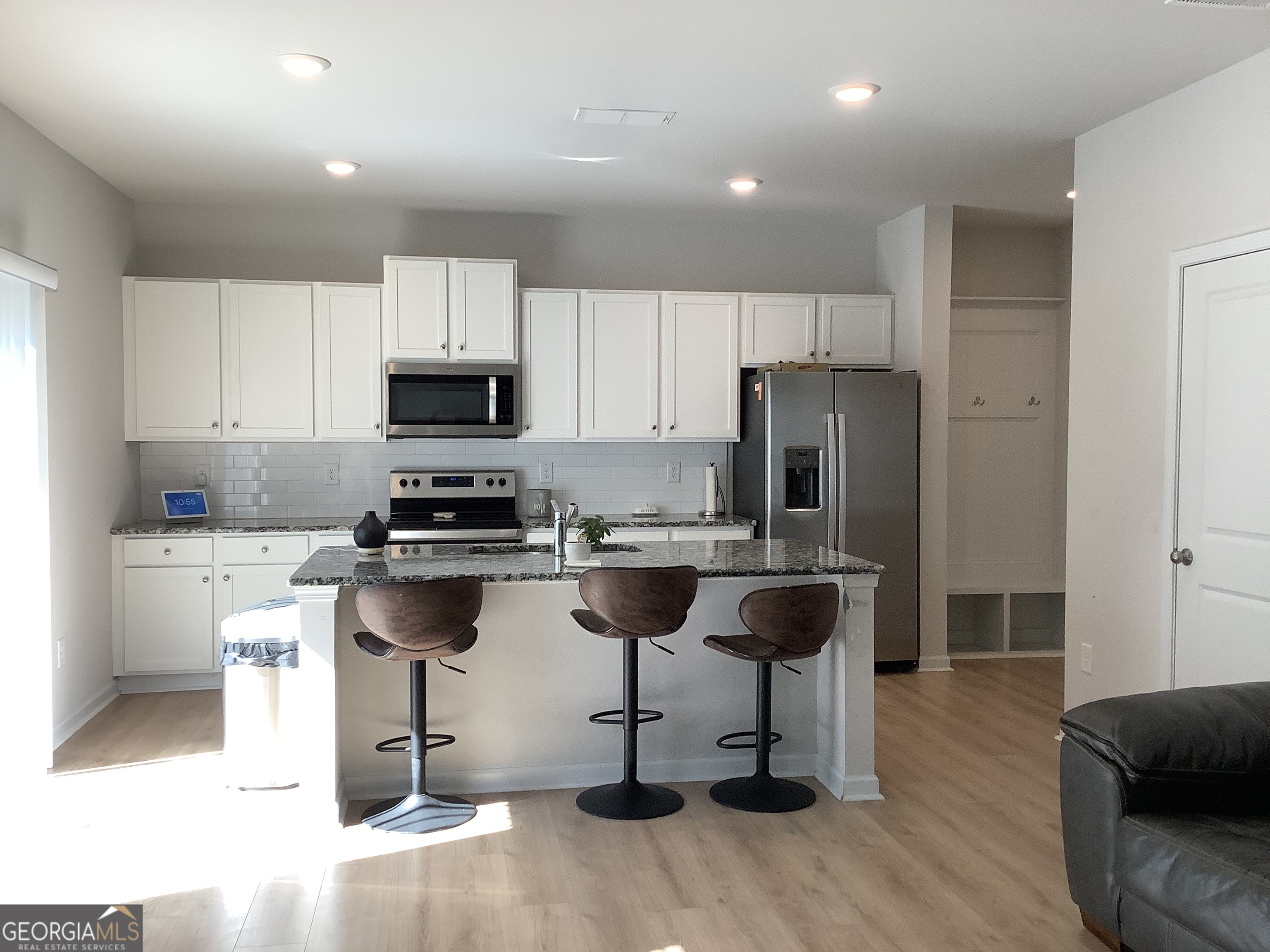 110 Summit Pointe Lane Dallas, GA 30132 - Photo 2 of 25 a kitchen with a refrigerator and a stove top oven