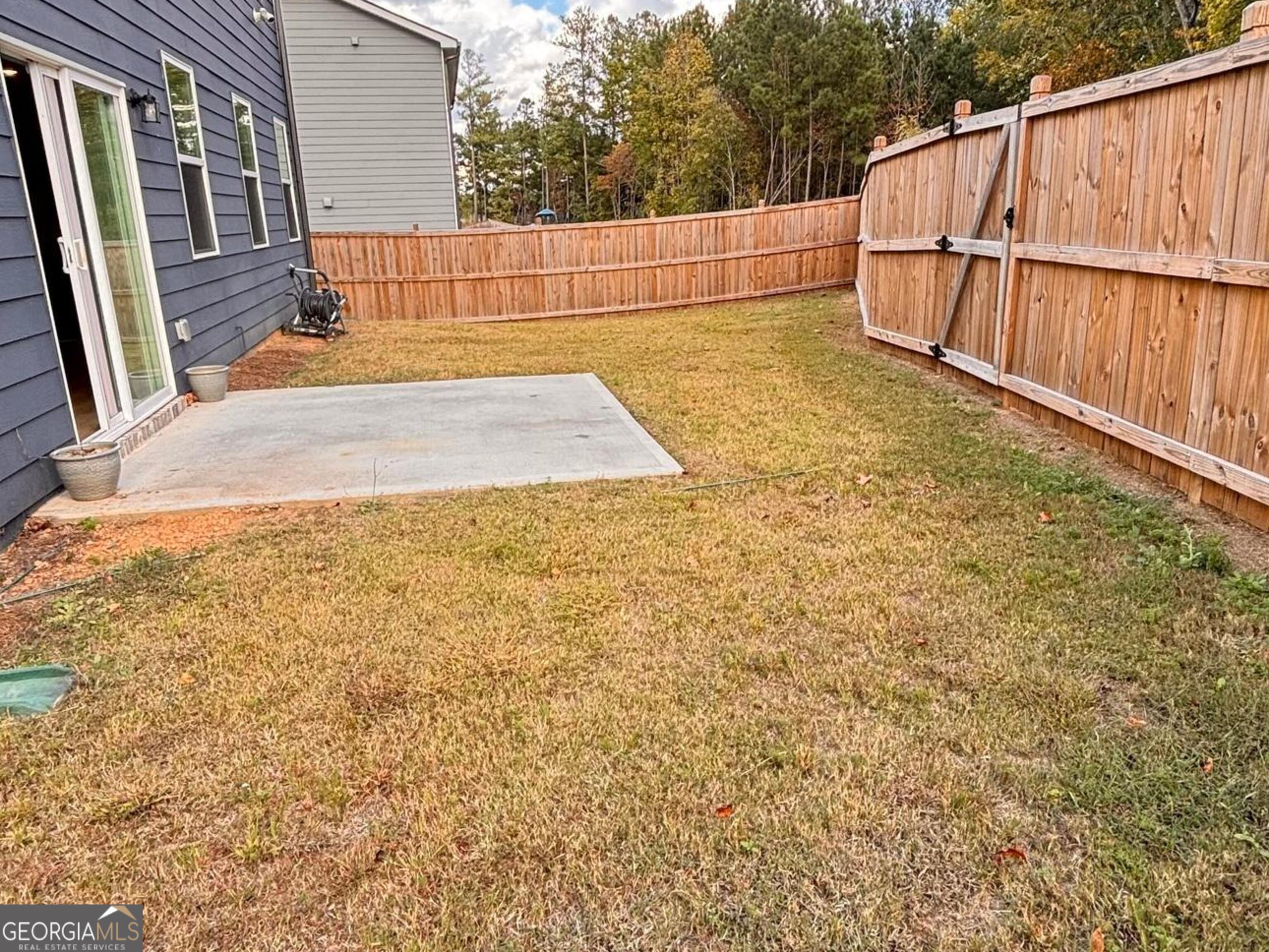 110 Summit Pointe Lane Dallas, GA 30132 - Photo 24 of 25 a view of backyard with wooden fence