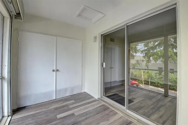 a view of an empty room and window