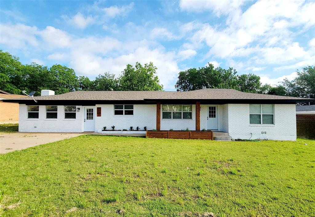 1447 West Lingleville Road Stephenville, TX 76401 - Photo 2 of 12 Single story home featuring brick siding, a front lawn, and covered porch